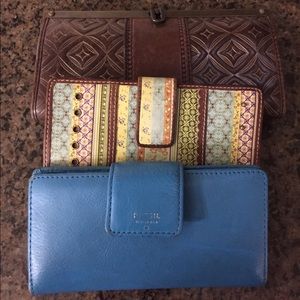 Bundle of 3 Fossil wallets.